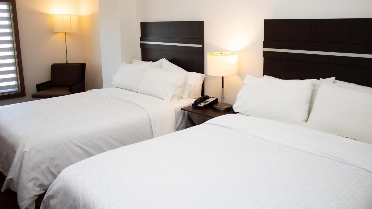 Holiday Inn Express Guaymas By Ihg Extérieur photo A typical room at the Hilton Garden Inn